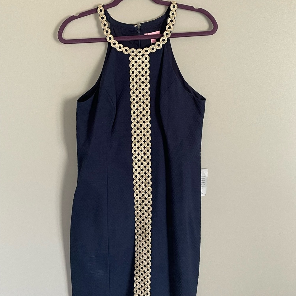 Lilly Pulitzer sleeveless navy blue dress with gold trim size 10.